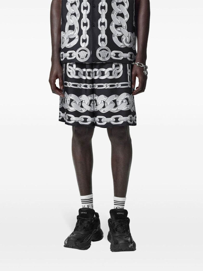Versace Knee-Length Activewear Shorts With Bold Chain Graphic
