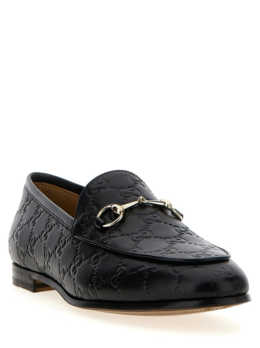 Gucci Embossed Calfskin Leather Loafers With Front Metal Clamp
