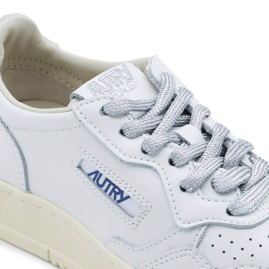 Autry Minimalist White Leather Sneakers With Perforated Detailing