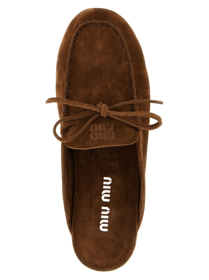 Miu Miu Suede Sabots With Rounded Toe And Decorative Bow