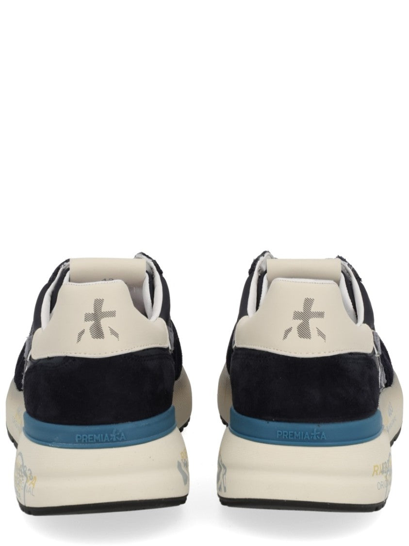 Premiata Dark Base Sneakers With Light Blue Laces And Cream Heel Accent