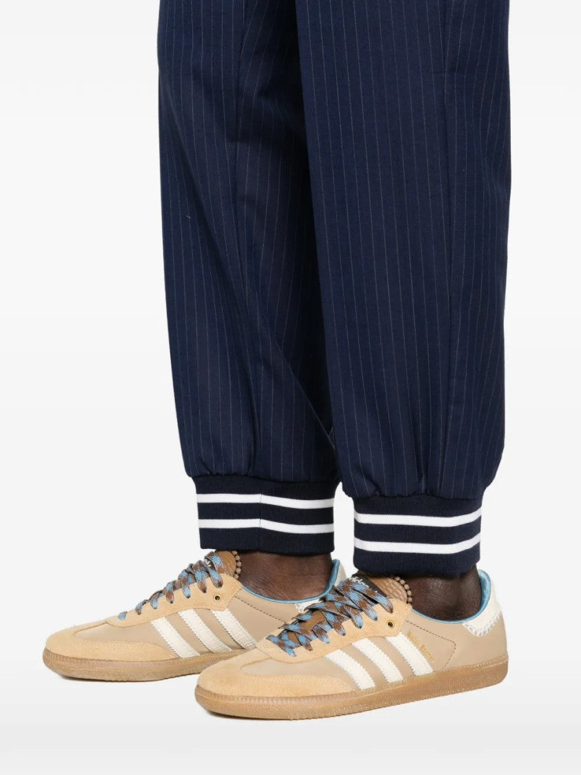 Moschino Relaxed Tapered Pants With Pinstripe Design And Elasticated Cuffs