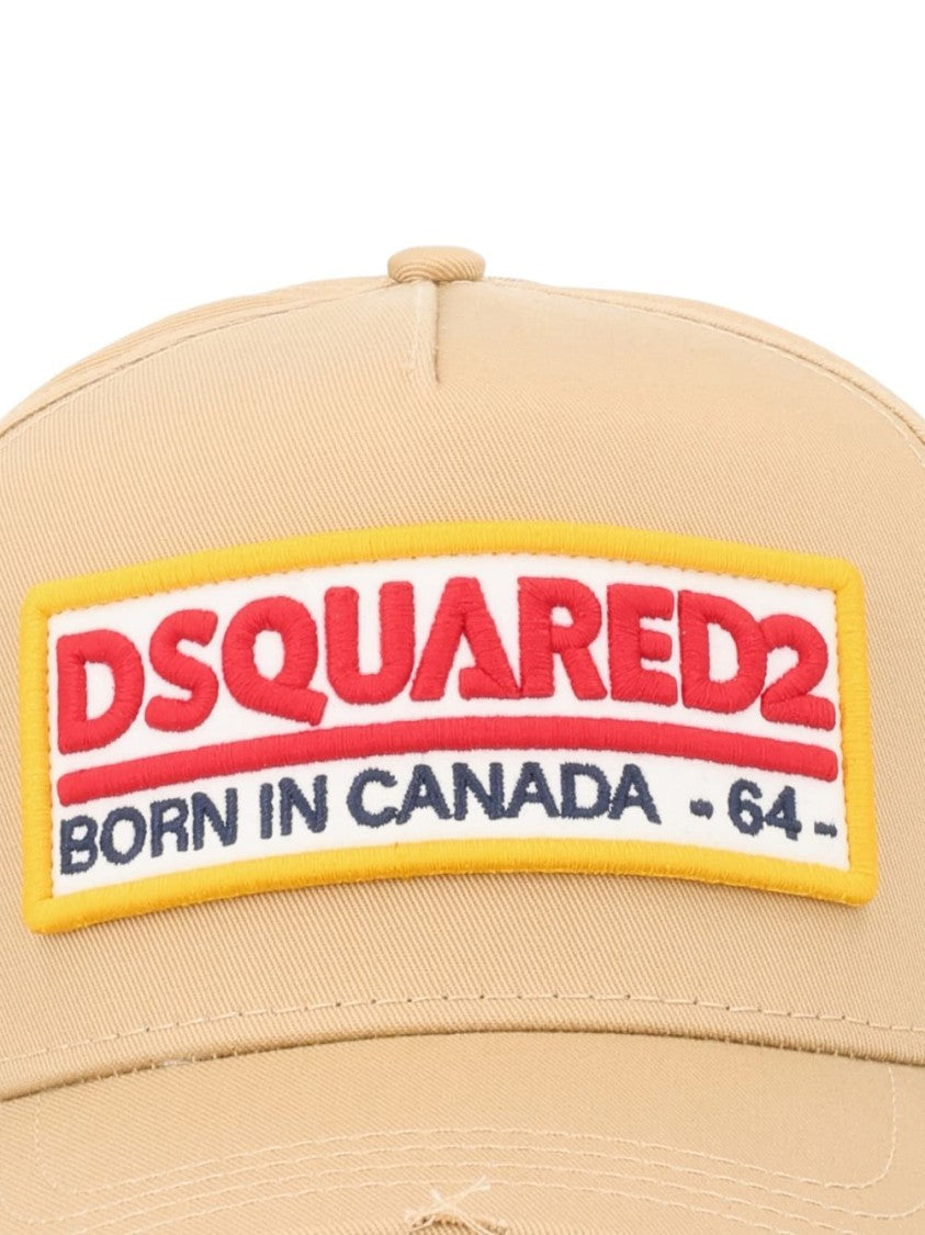 Dsquared2 Beige Baseball Cap With Bold Logo Patch And Distressed Details