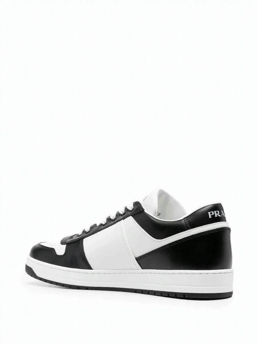 Prada Low-Top Leather Sneakers With Perforated Detailing And Triangular Logo