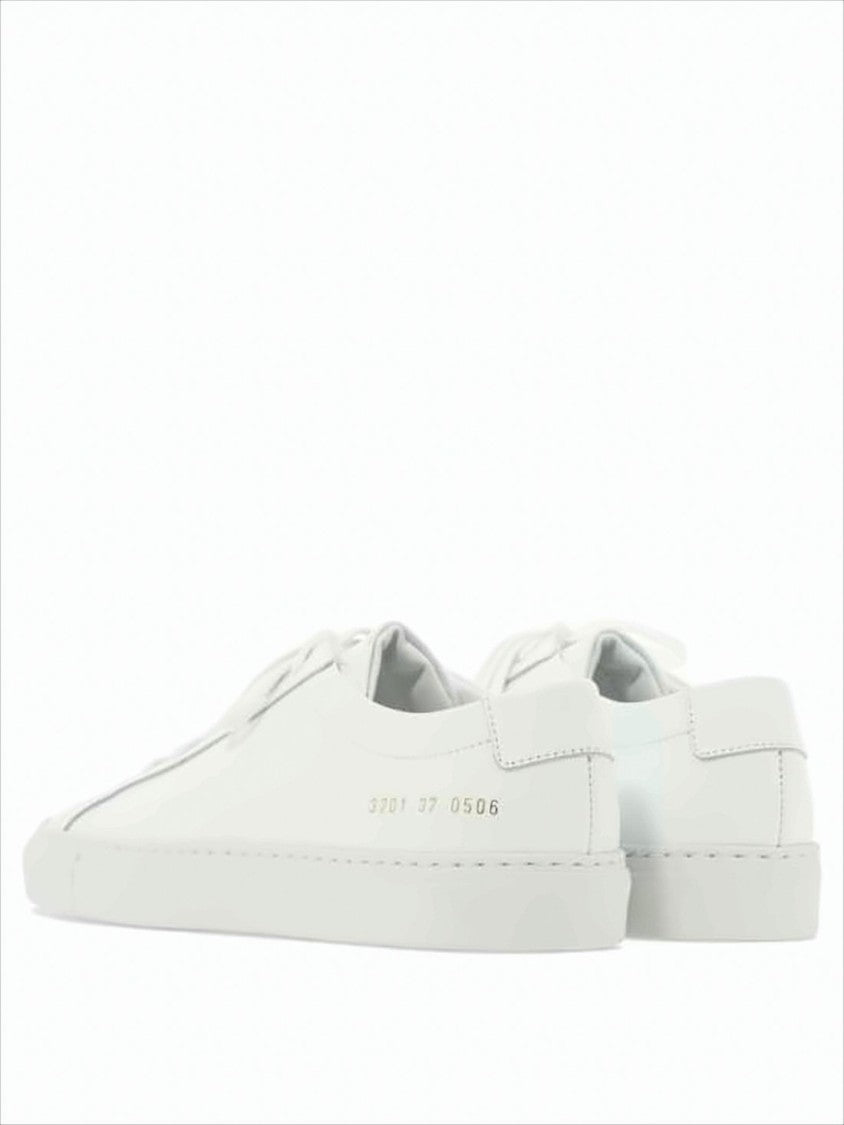 Common Projects Minimalist White Leather Sneakers With Embossed Detail