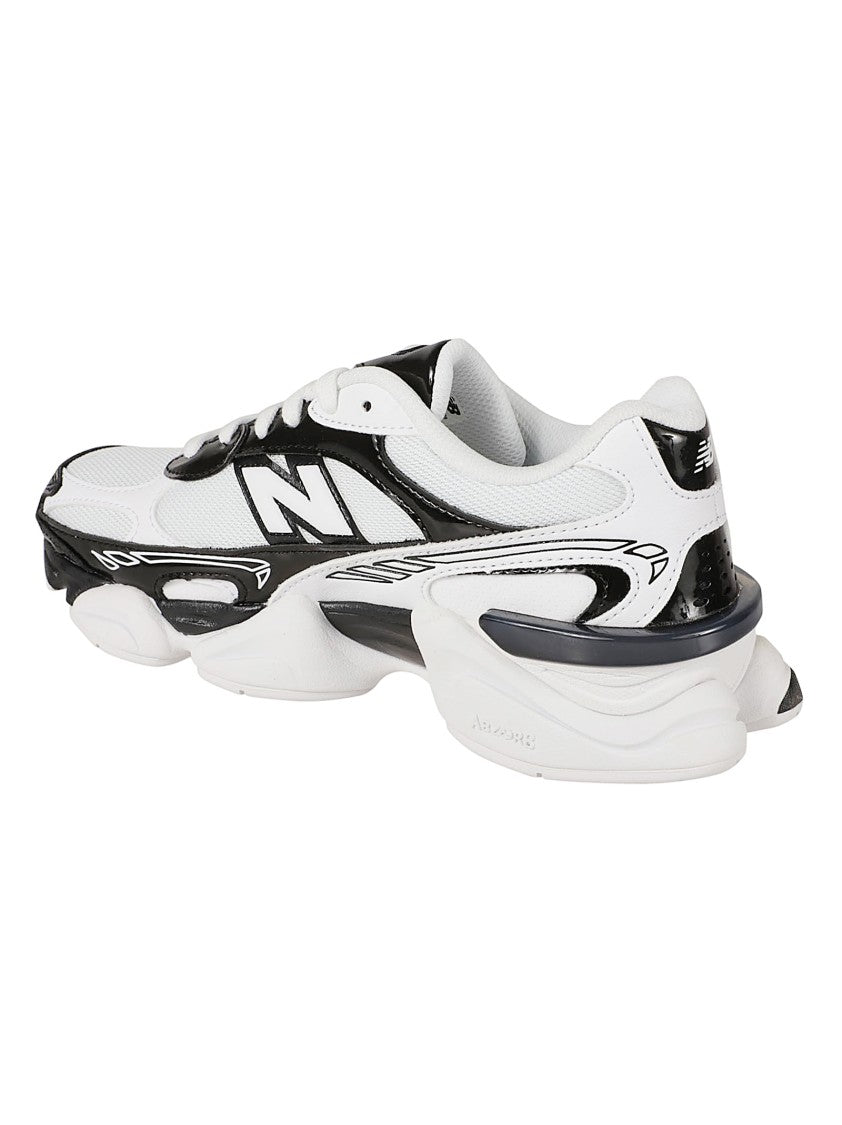 New Balance Dynamic Sneakers With Glossy Black Accents And Sculpted Sole