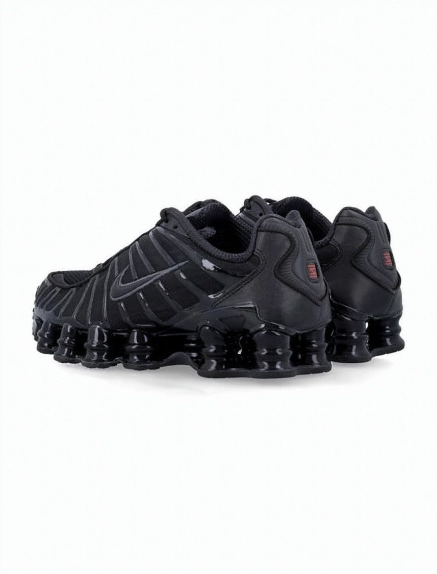 Nike All-Black Nike Sneakers With Segmented Sole