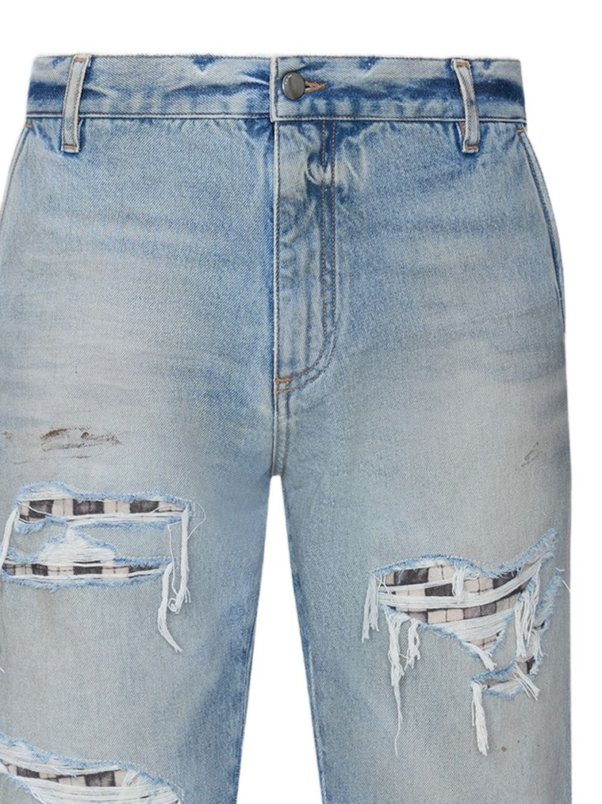 Amiri Light Blue Denim Jeans With Distressed Patchwork Details