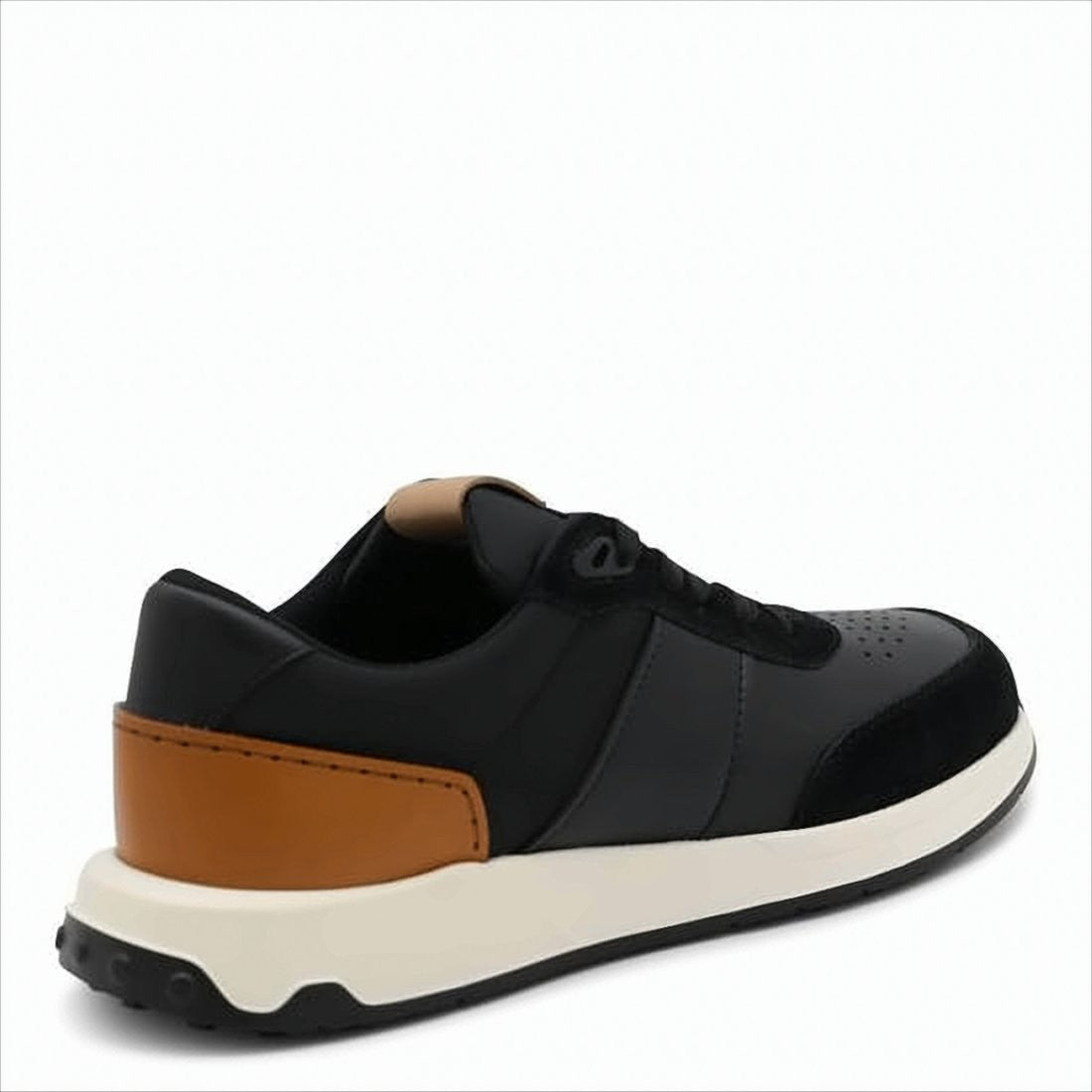 Tod's Black Leather Sneakers With Perforated Detailing And Tan Heel Patch