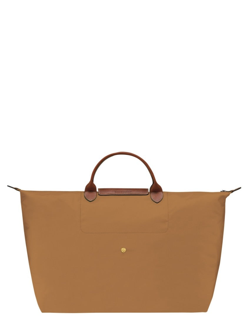 Longchamp Spacious Travel Bag With Structured Silhouette And Leather Accents