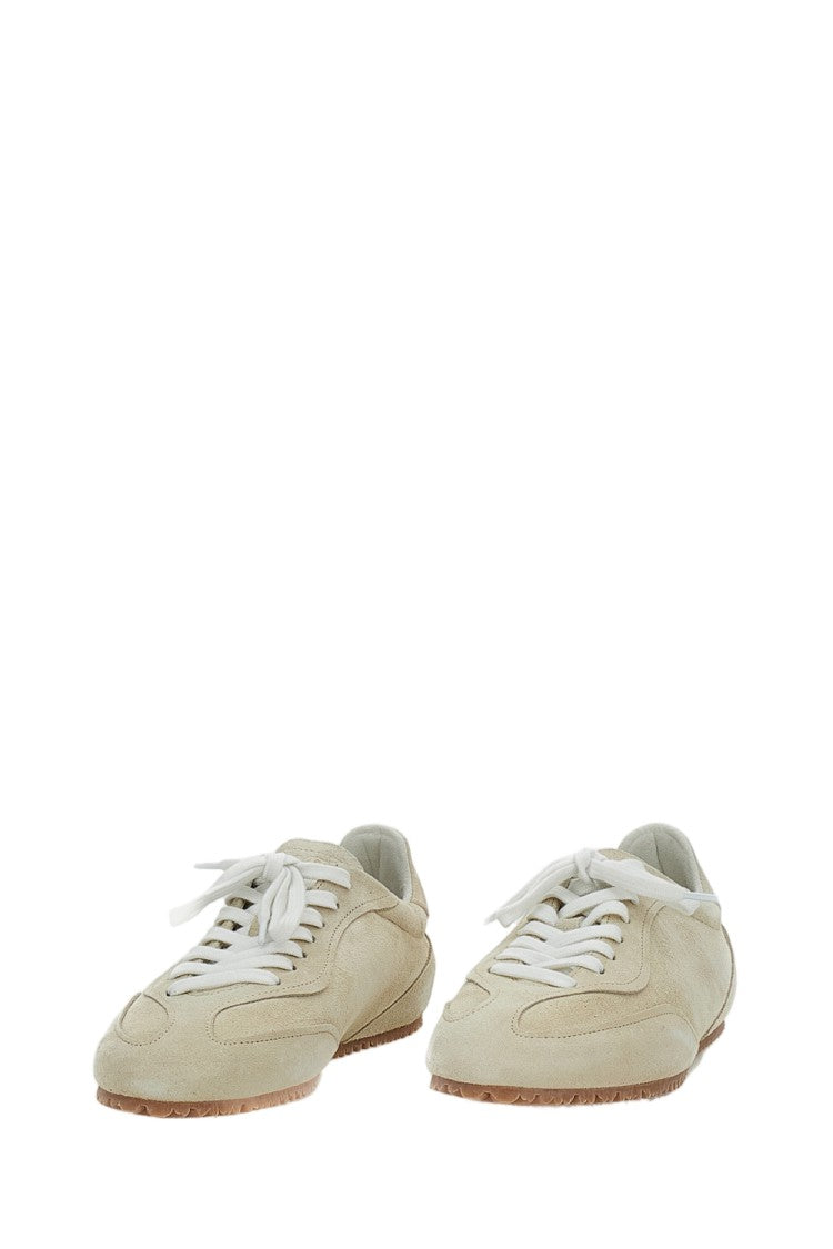 Axel Arigato Minimalist Beige Low-Profile Sneakers With Cross-Panel Design