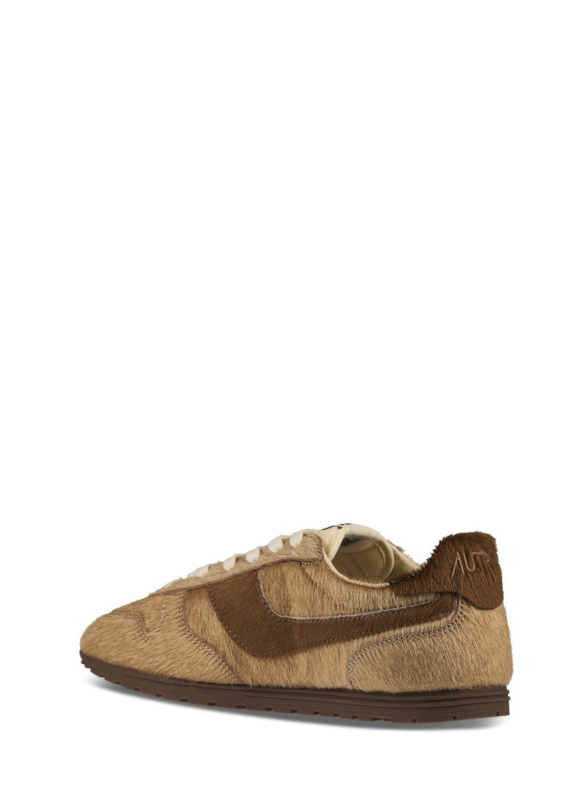 Autry Textured Brown Sneakers With Contrasting Swoosh