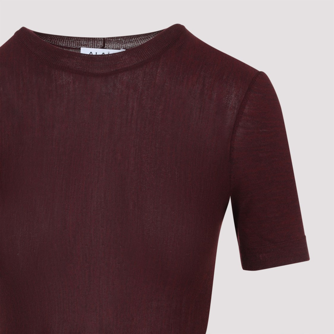 Alaïa Fitted Wool Dress With Pleated Skirt