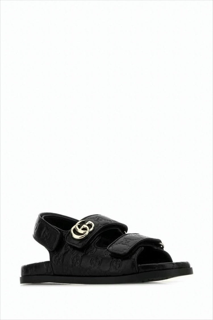 Gucci Leather Flat Sandals With Embossed Patterns