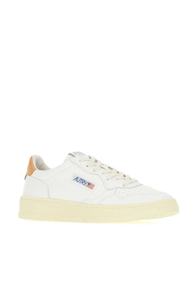 Autry Minimalist White Leather Low-Top Sneakers With Perforated Detailing