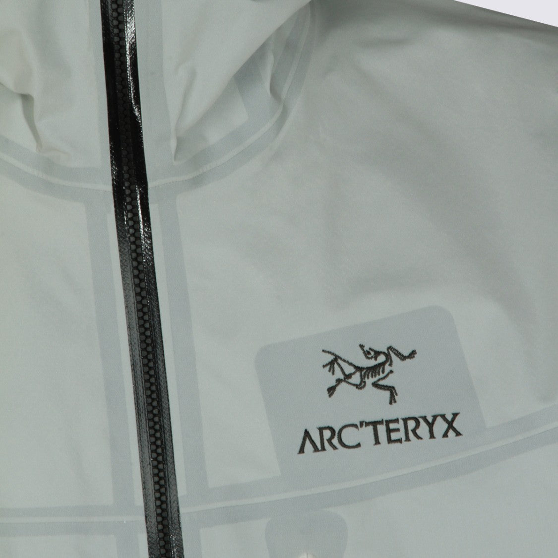 Arc'teryx Light Grey Minimalist Jacket With Hood And Zippered Pocket