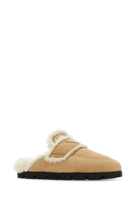 Prada Slip-On Mules With Plush Shearling Lining And Rugged Sole
