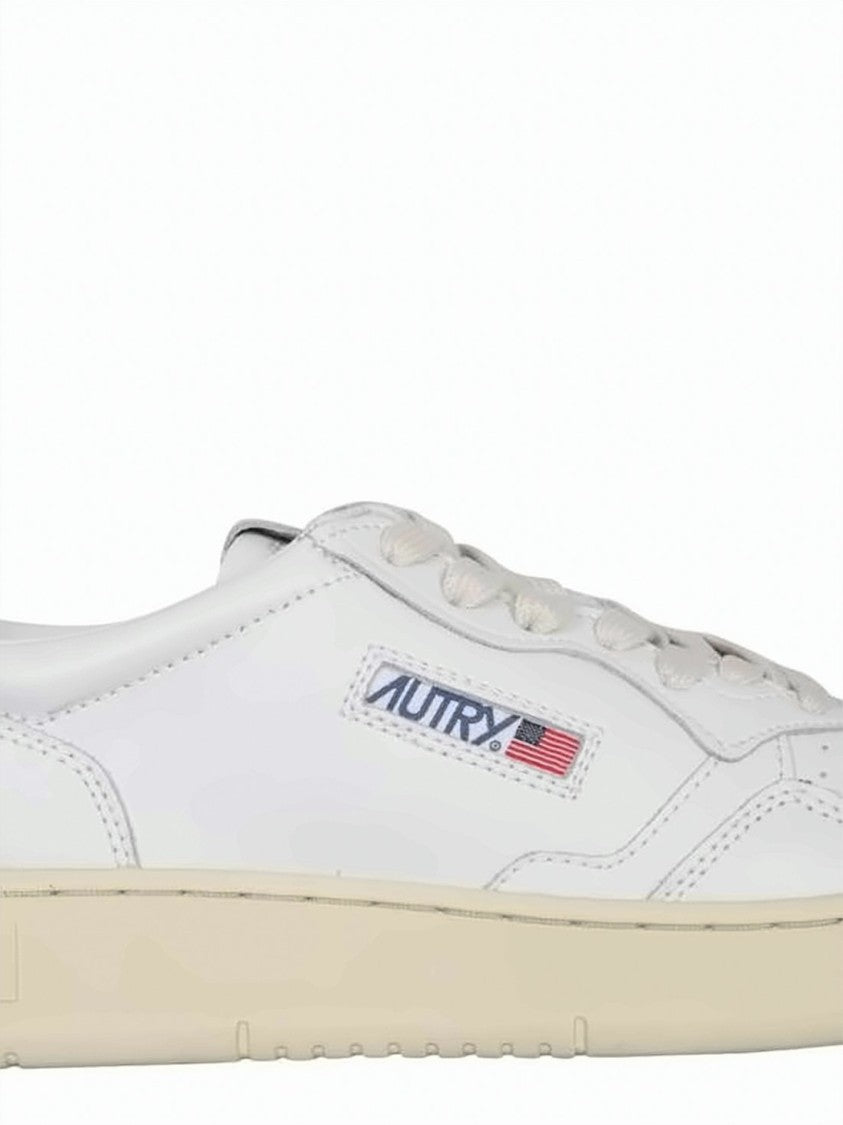 Autry Low-Top Leather Sneakers With Perforated Detailing And Accents