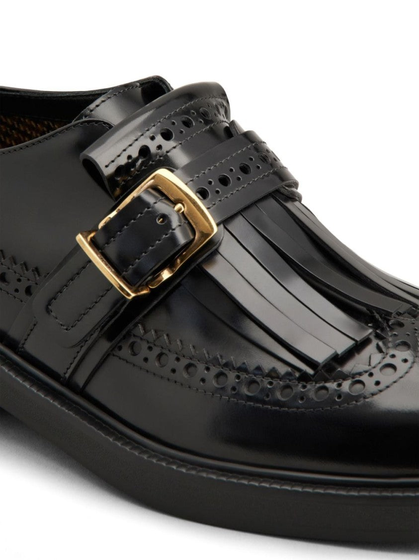 Tod's Elegant Black Shoes With Decorative Buckle And Fringe Detail