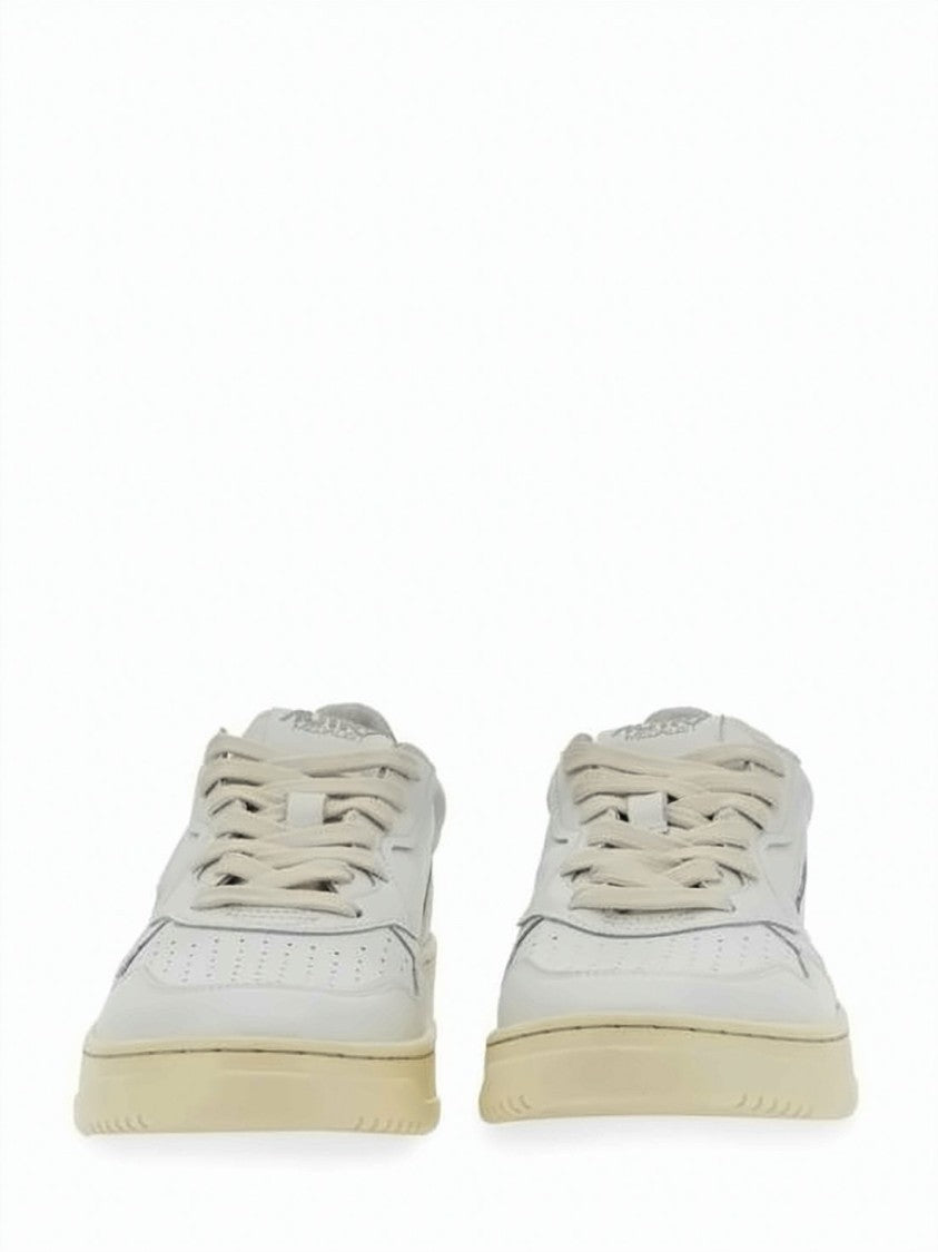 Autry Low-Top Leather Sneakers With Perforated Detailing And Metallic Accents