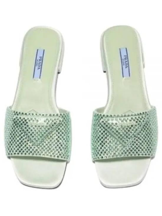 Prada Textured Green Slip-On Mules With Square Toe Design