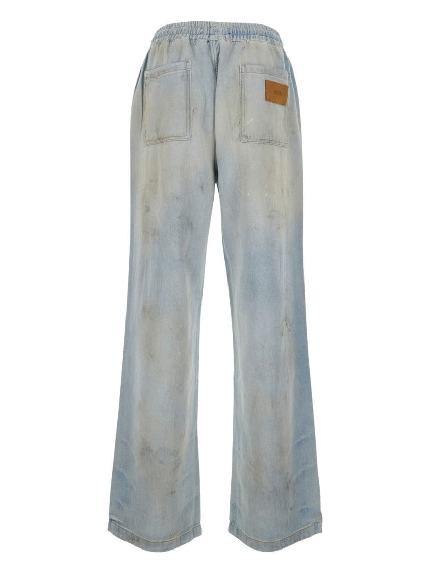 Amiri Relaxed Fit Light Blue Distressed Jeans