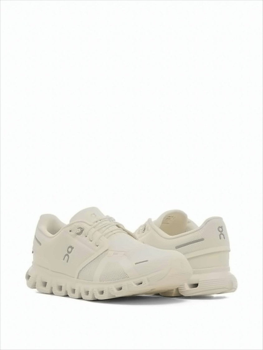 On Running Sleek Minimalist Sneakers With Breathable Mesh Upper