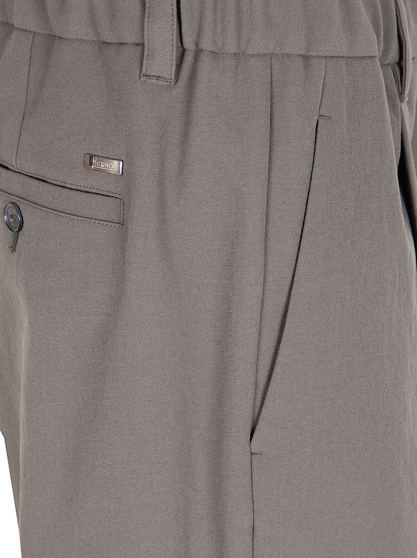 Herno Tailored Green Trousers With Pleated Front And Subtle Sheen