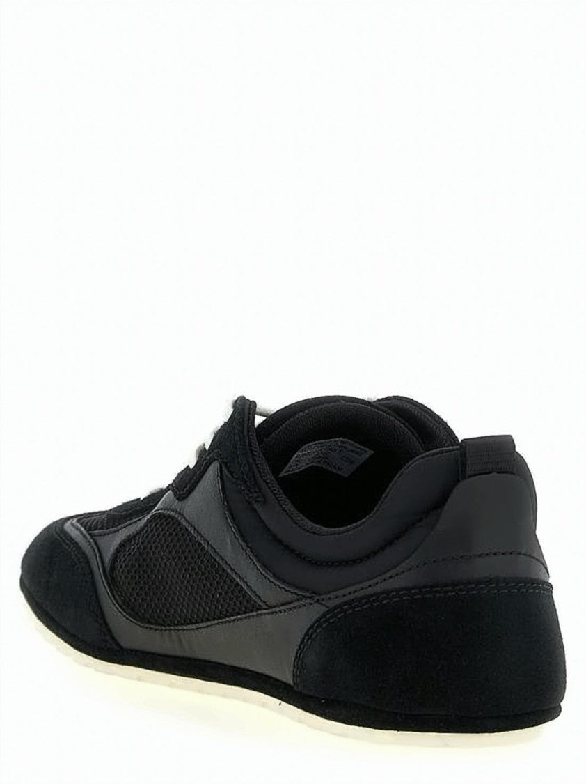 Tory Burch Low-Profile Black Sneakers With Sleek Design And Breathable Mesh Panels