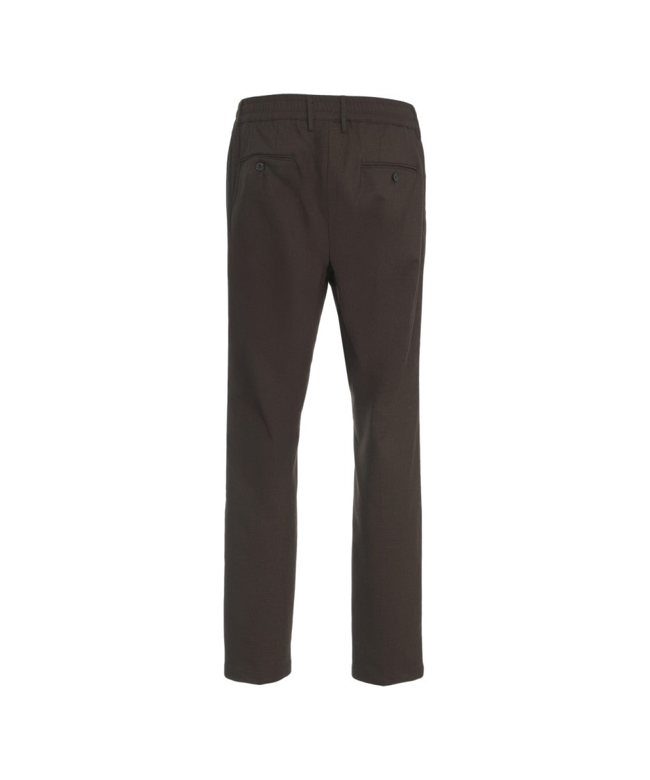 Cruna Pleated Chinos With Oblique Pockets