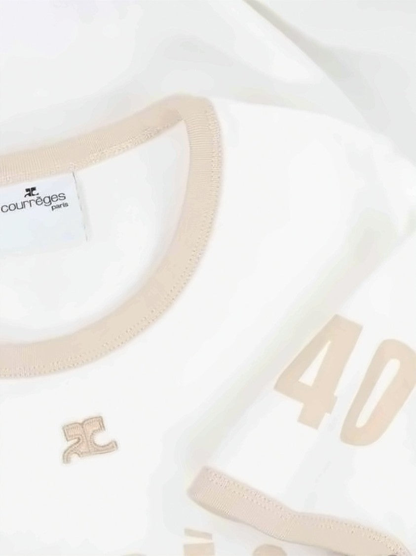 Courrèges Cropped White T-Shirt With Beige Trim And Curved Logo