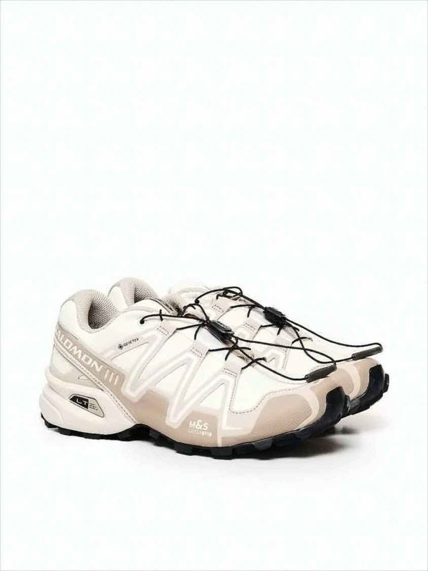Salomon Low-Profile Sporty Sneakers With Adjustable Lace Toggle