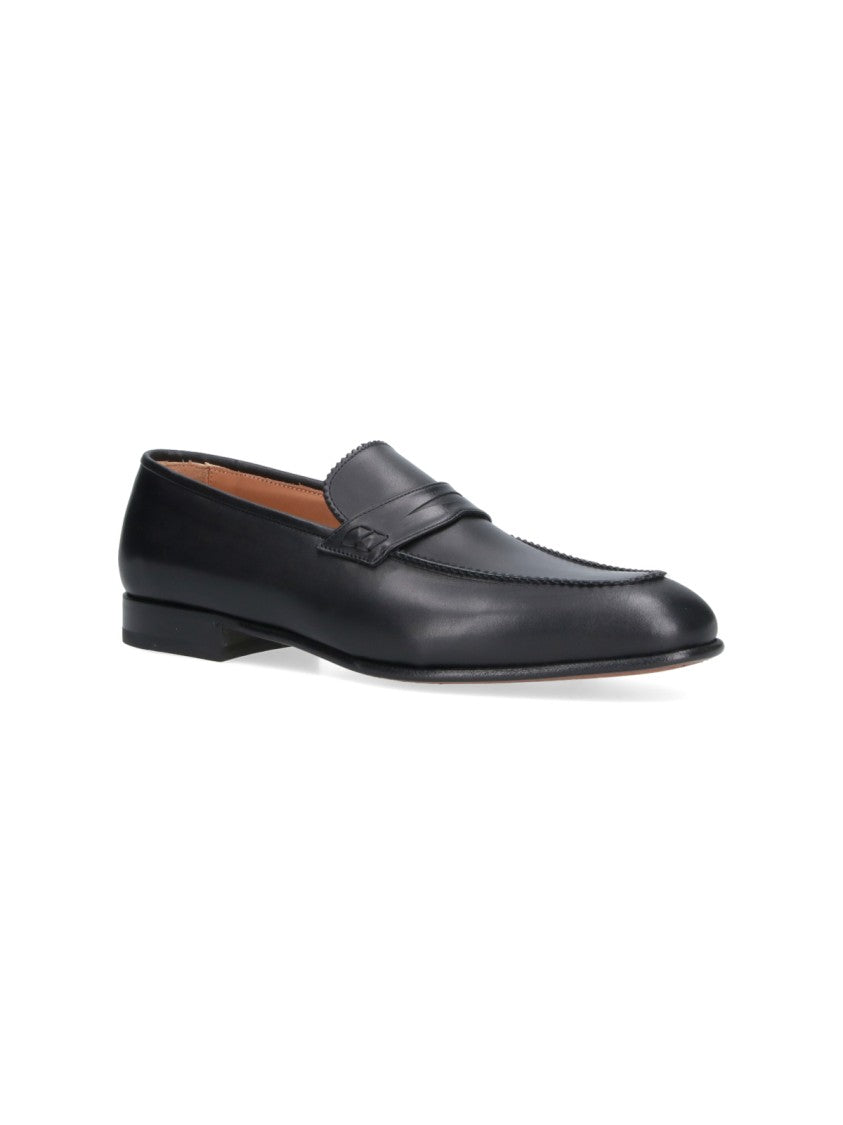 Ferragamo Black Round Toe Smooth Leather Loafers