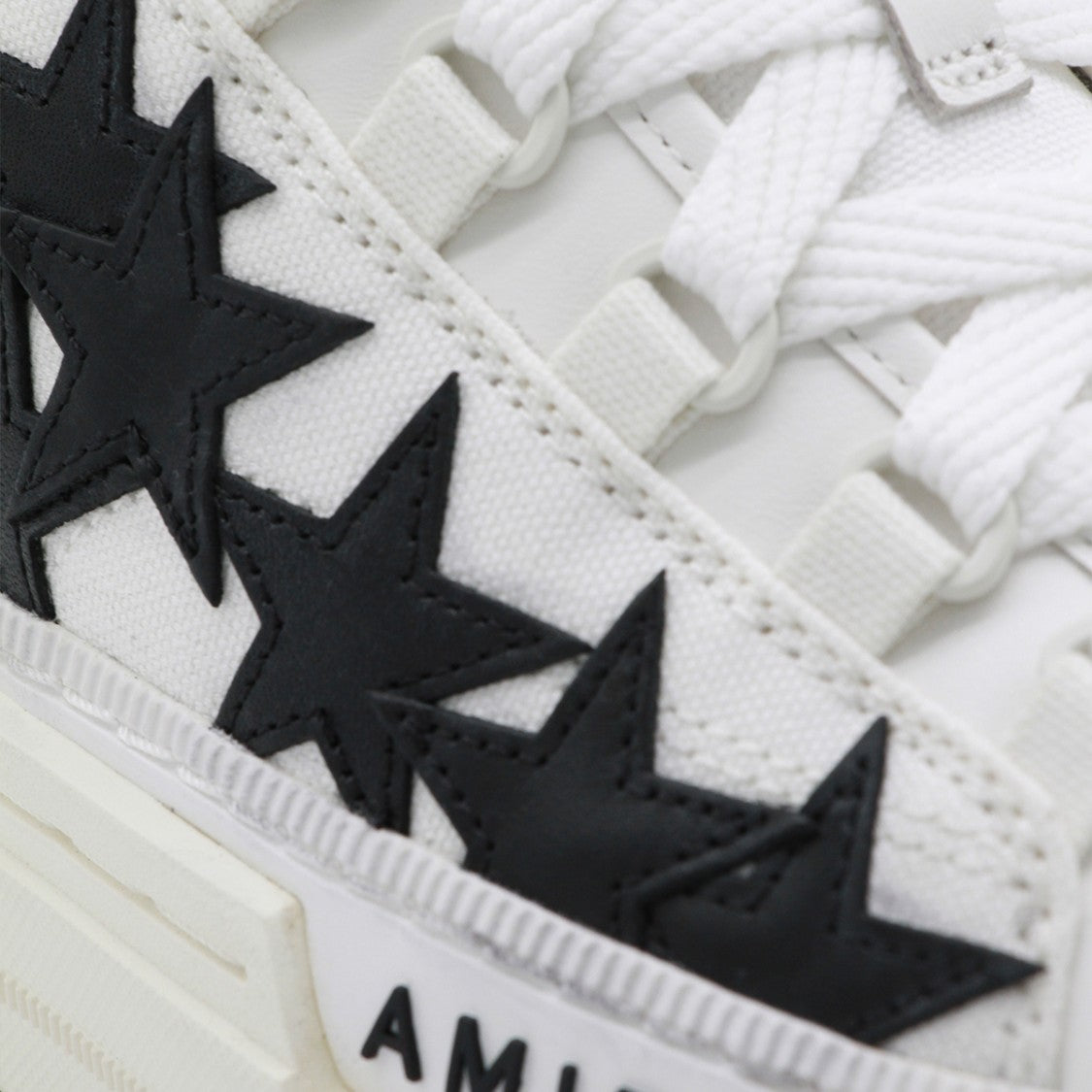 Amiri Chunky Sole Sneakers With Bold Star Appliqués