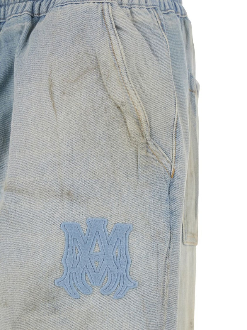 Amiri Relaxed Fit Light Blue Distressed Jeans
