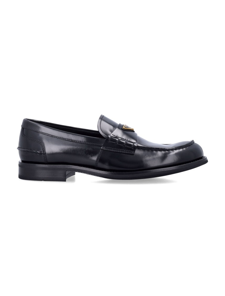 Prada Brushed Leather Loafers With Enameled Metal Logo