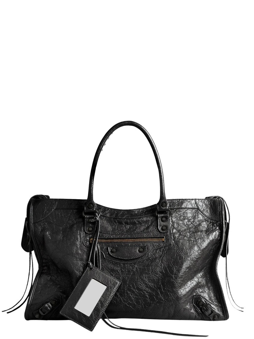 Balenciaga Textured Leather Travel Bag With Removable Charm And Adjustable Strap