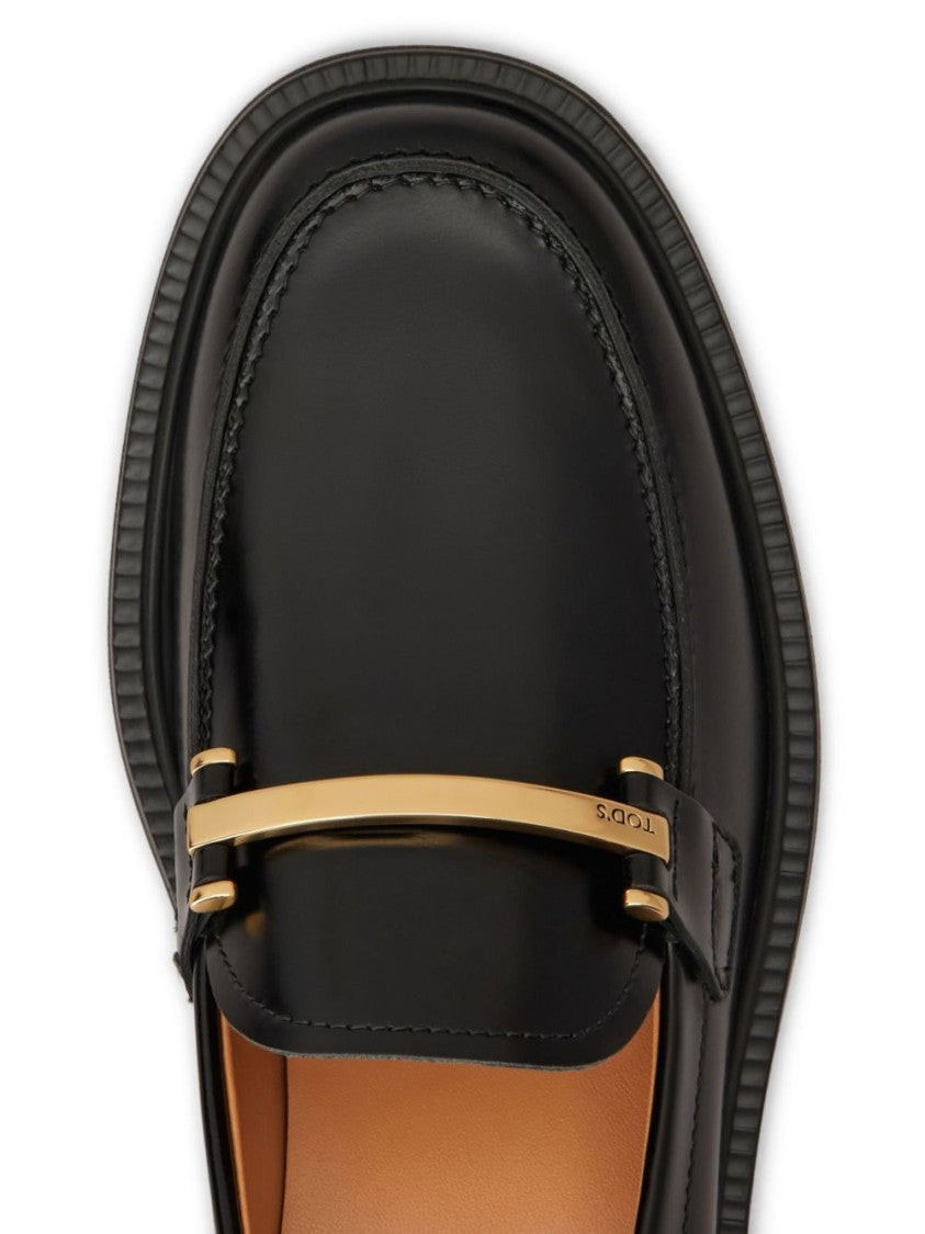 Tod's Black Minimalist Round Toe Slip-On Flats
