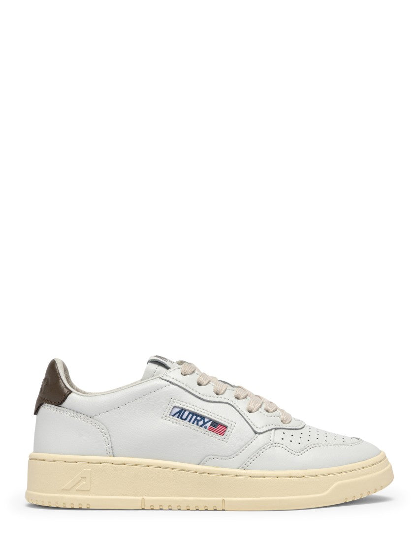 Autry Low-Top Sneakers With Perforated Detailing And Vintage Aesthetic