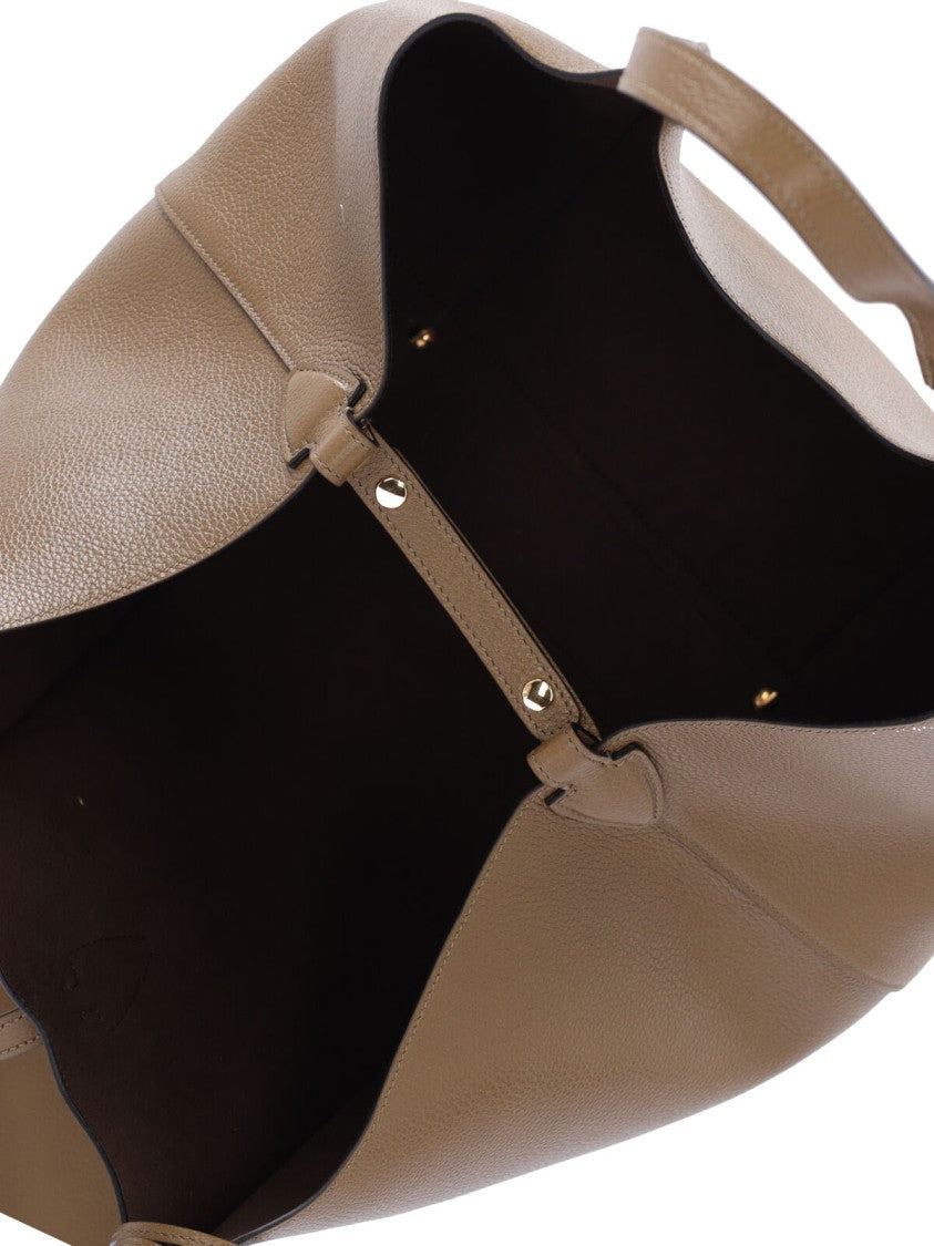 Tod's Spacious Textured Brown Handbag With Central Clasp