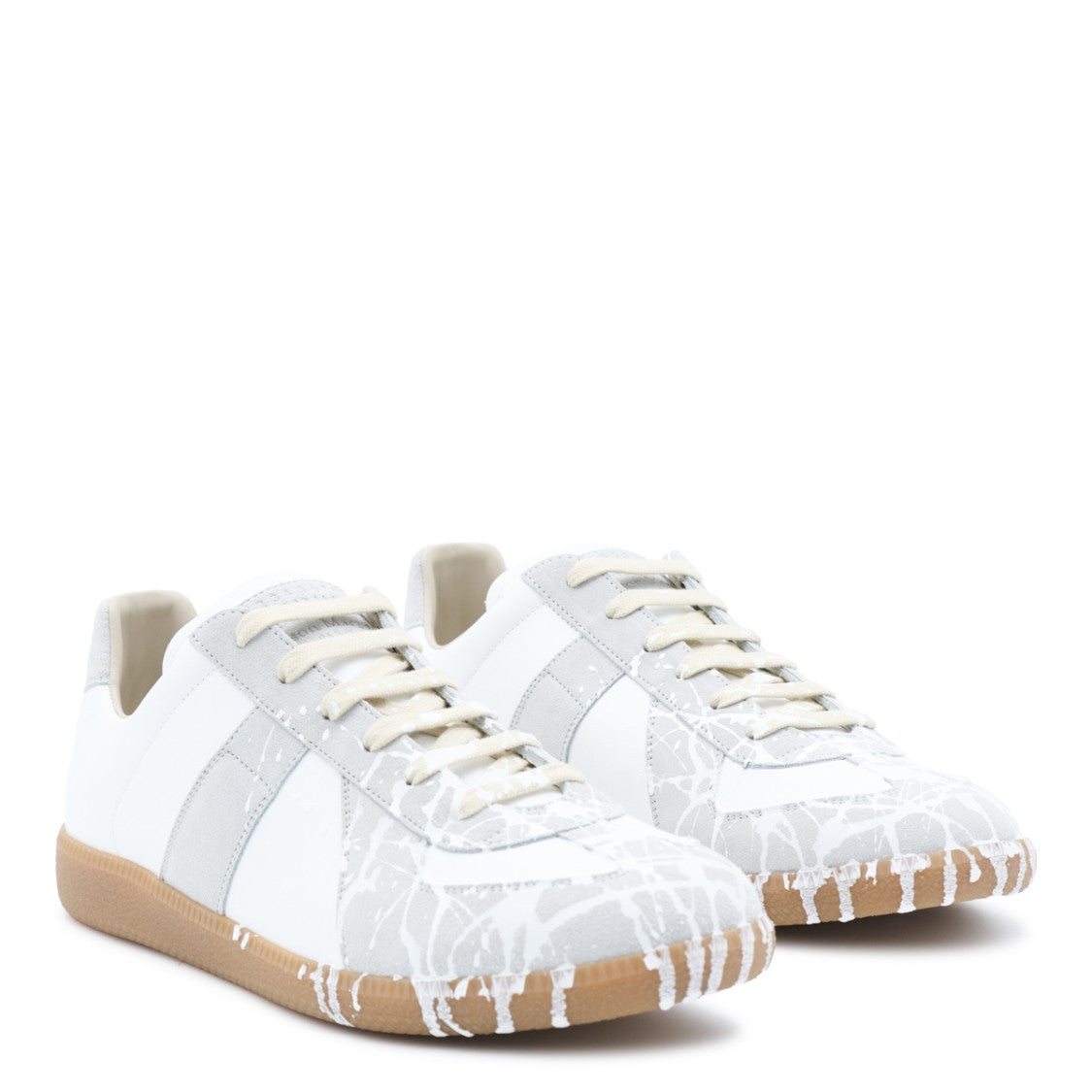 Maison Margiela Artfully Designed Off-White Leather Sneakers With Textured Accents
