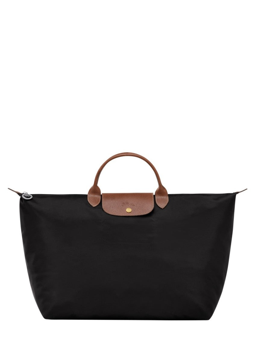 Longchamp Spacious Travel Bag With Leather Handles And Subtle Logo