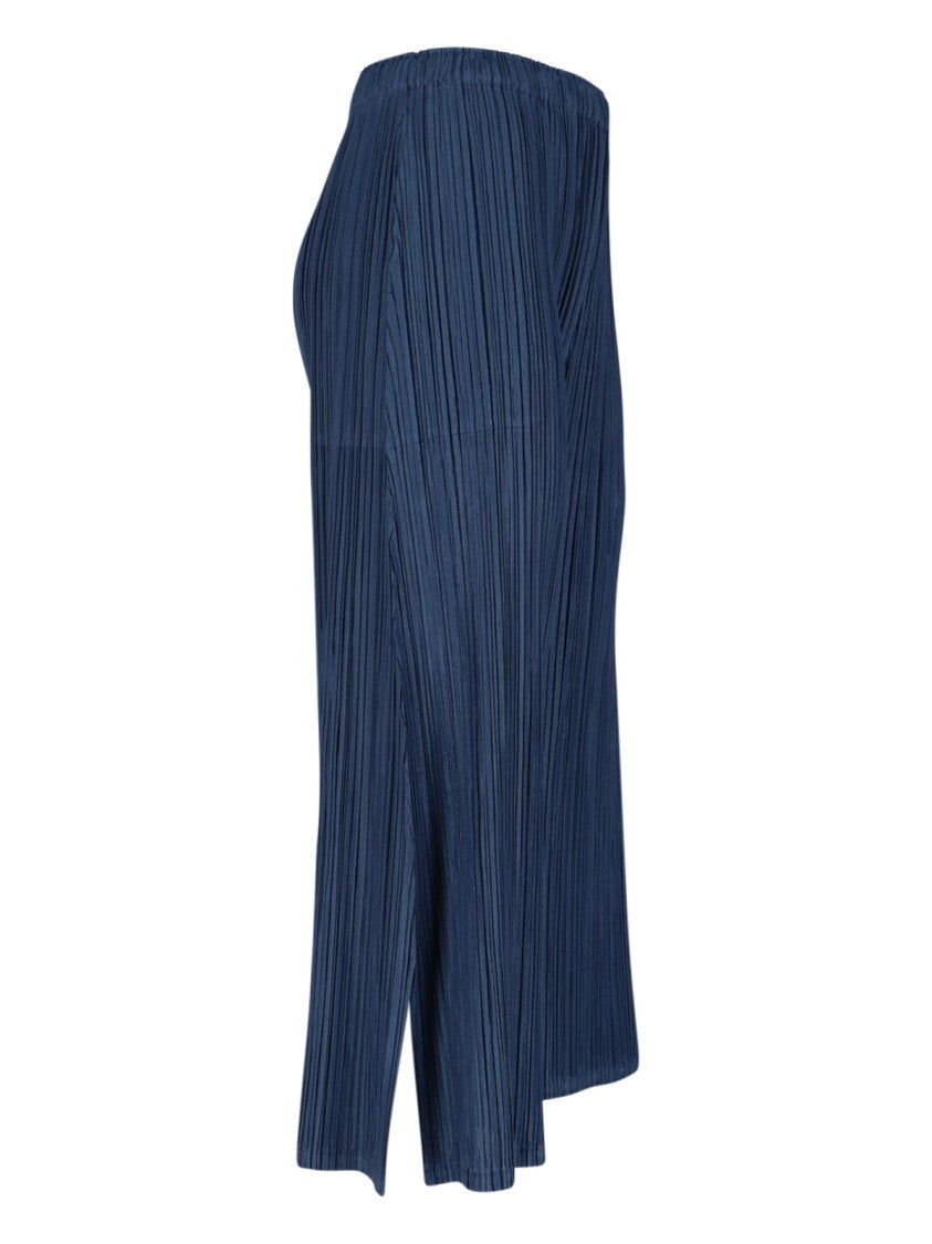 Pleats Please Pleated Relaxed Fit Trousers With Straight Leg Design