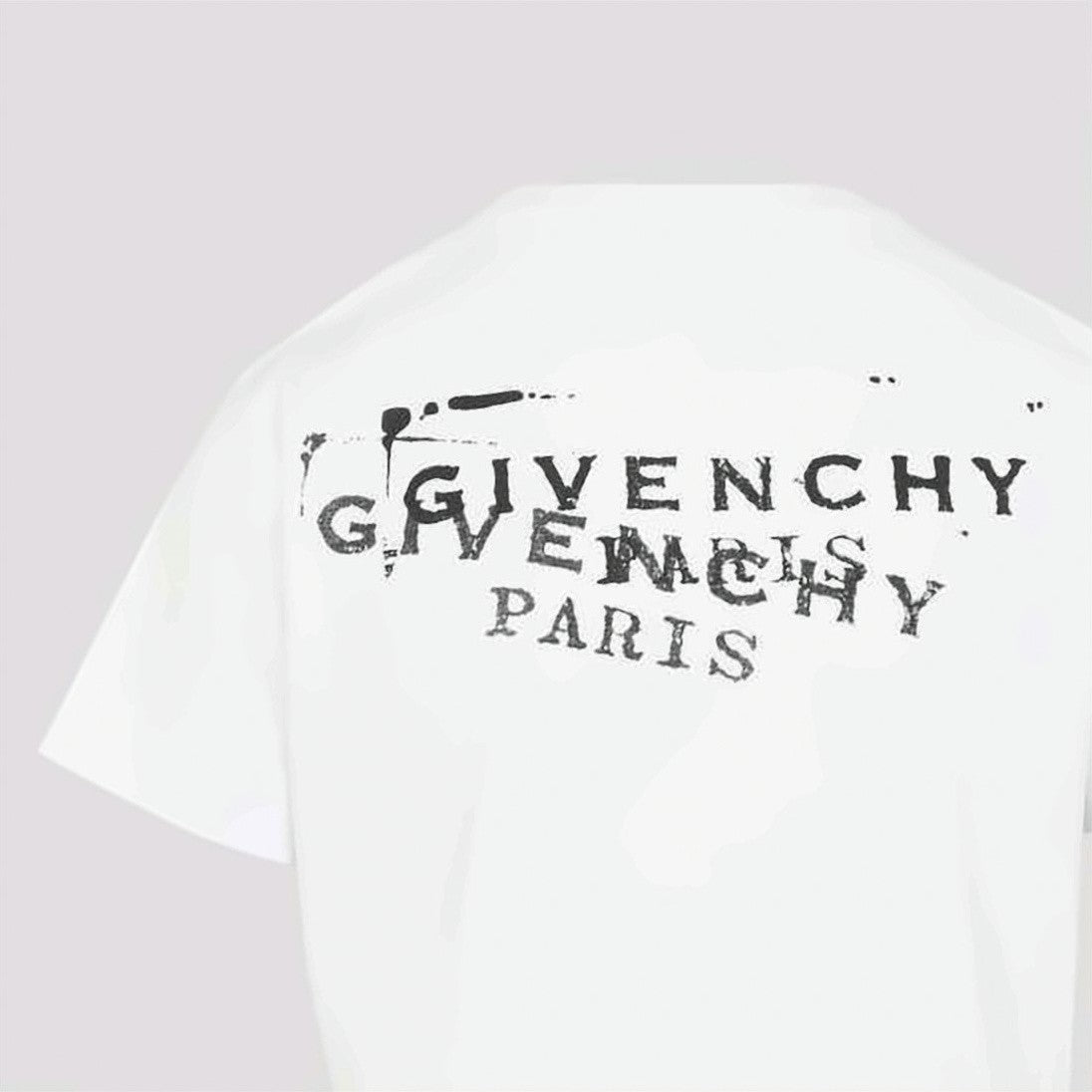 Givenchy Short-Sleeved Crew Neck T-Shirt With Distressed Logo Prints