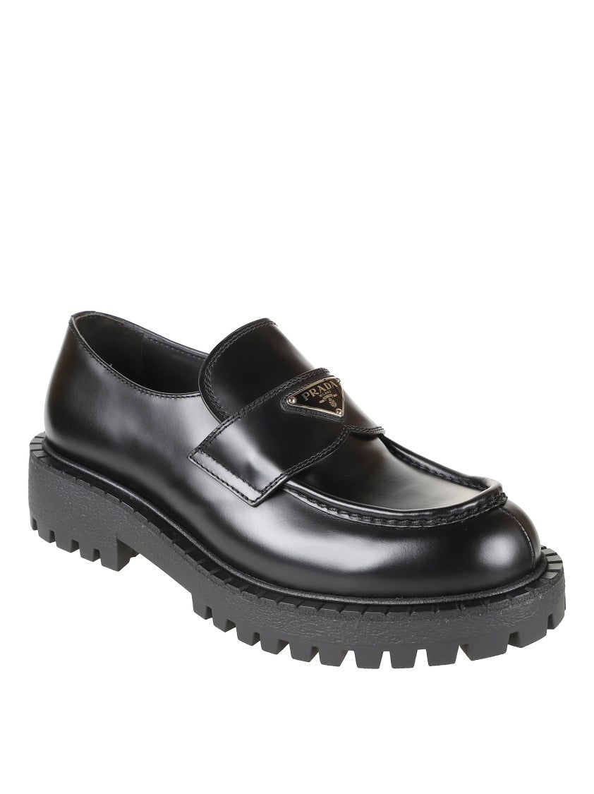 Prada Polished Black Leather Loafers With Chunky Rubber Sole