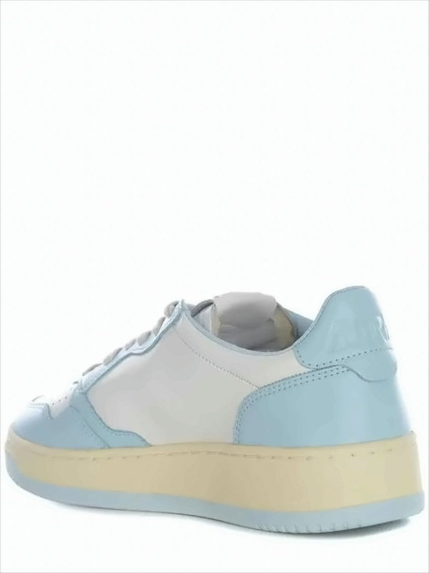Autry Low-Top Sneaker With Light Blue Overlays And Cream Sole