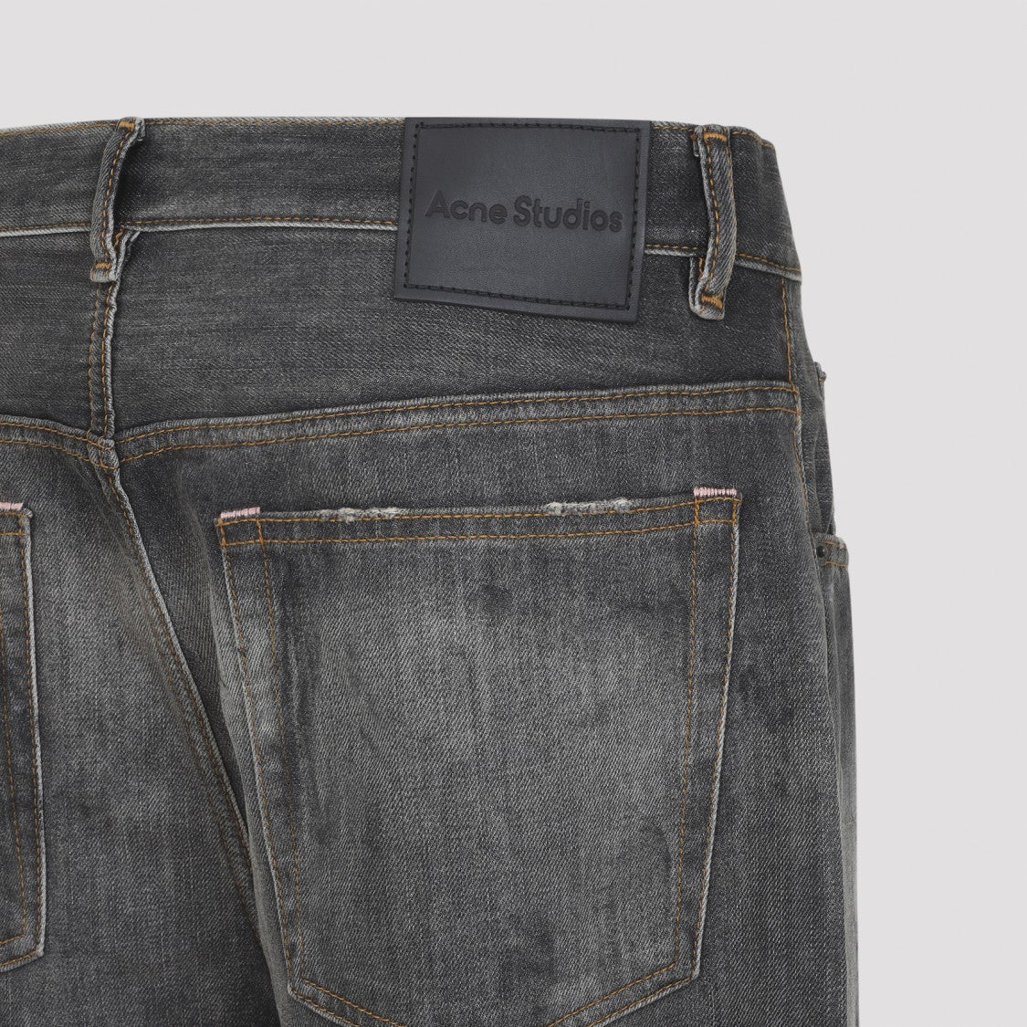 Acne Studios Relaxed Flared Jeans With Faded Black Wash And Distressed Details