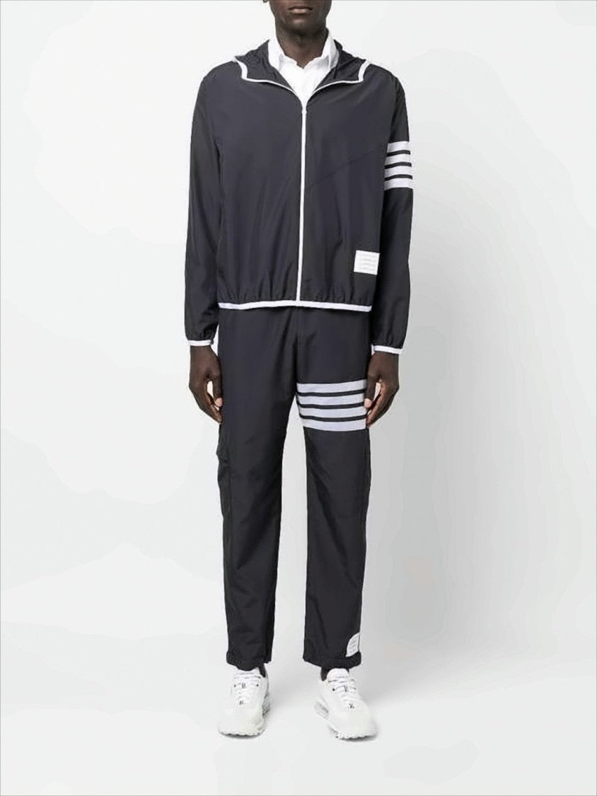 Thom Browne Sleek Black Training Jogger Pants With Distinctive Stripes