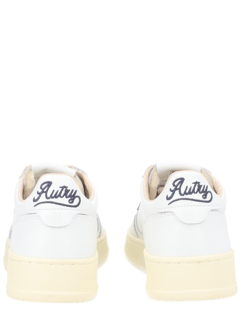 Autry Minimalist Cow Leather Perforated Sneakers