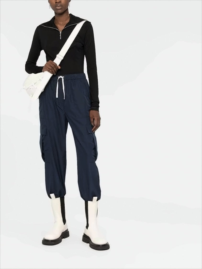 Jil Sander Fitted Turtleneck With Half-Zip Closure And Subtle Branding